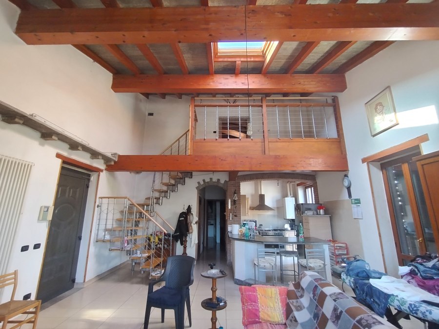 Soggiorno con cucina a vista